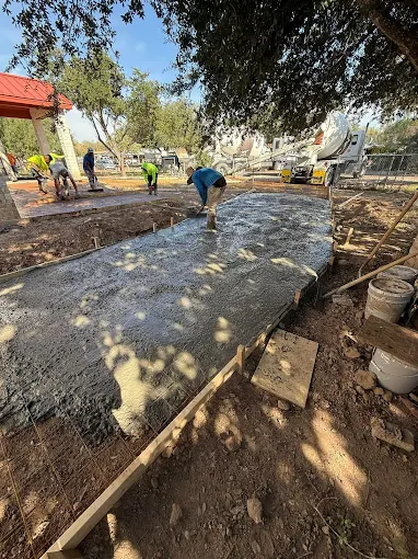 Custom concrete driveway construction by Zeb’s Concrete serving homeowners across McAllen and the Rio Grande Valley. This installation highlights durability, smooth finishing, and attention to detail, providing a long-lasting driveway built to handle daily use, moisture changes, and extreme temperatures common to South Texas.